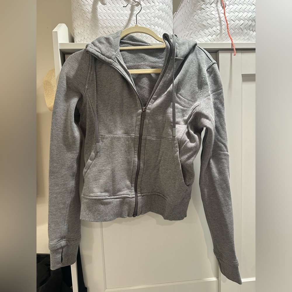 Lululemon size 4 full zip grey hoodie with thumb holes.